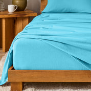 A modern bedroom with cotton flannel sheets on the bed