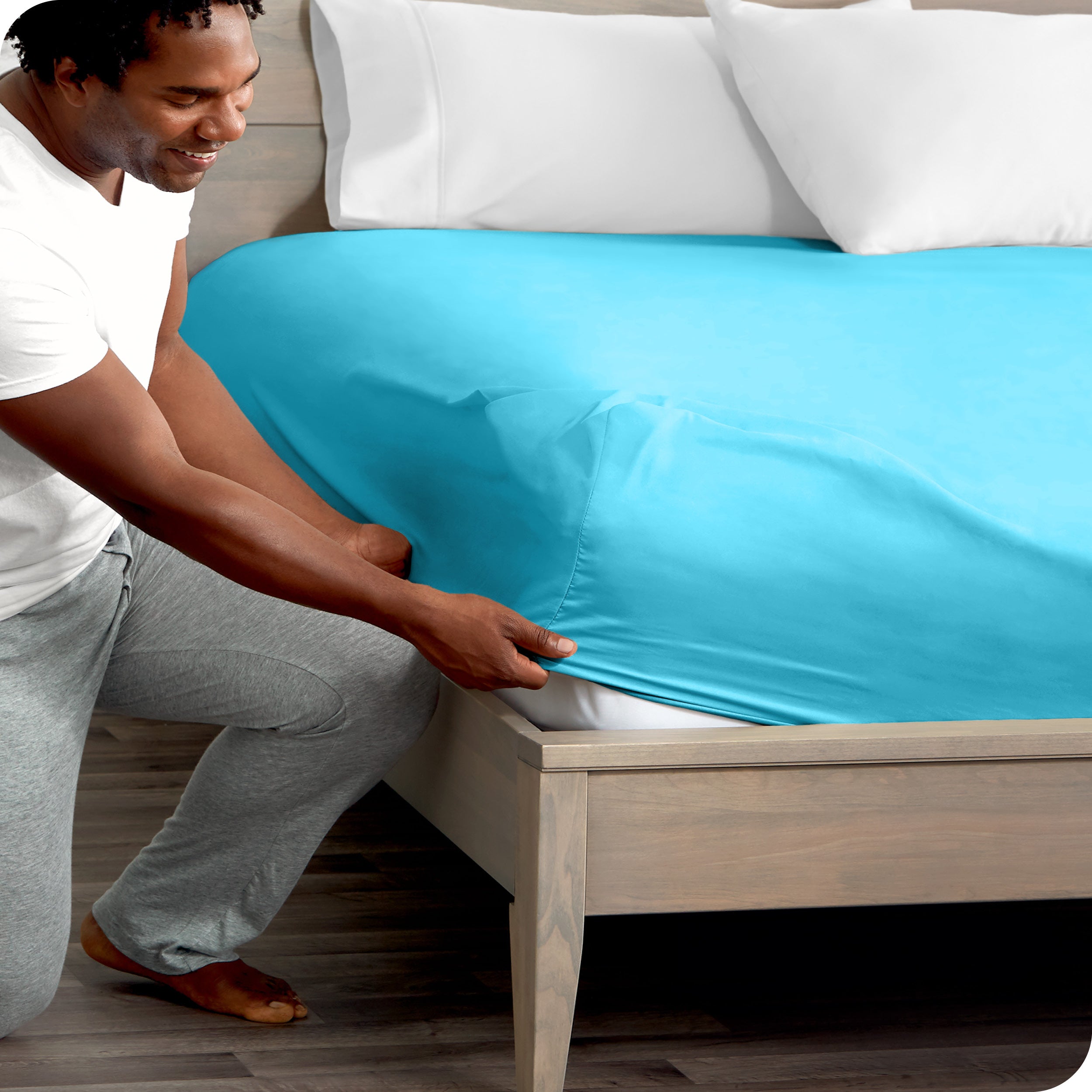 A close up of the elastic of a microfiber fitted sheet.