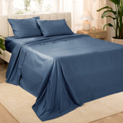 Sateen bed sheets and pillowcases on a bed in a bedroom setting.