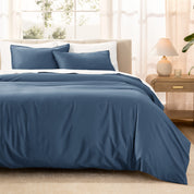 Warm bright room scene showing Sateen Duvet Set  laid out over the bed