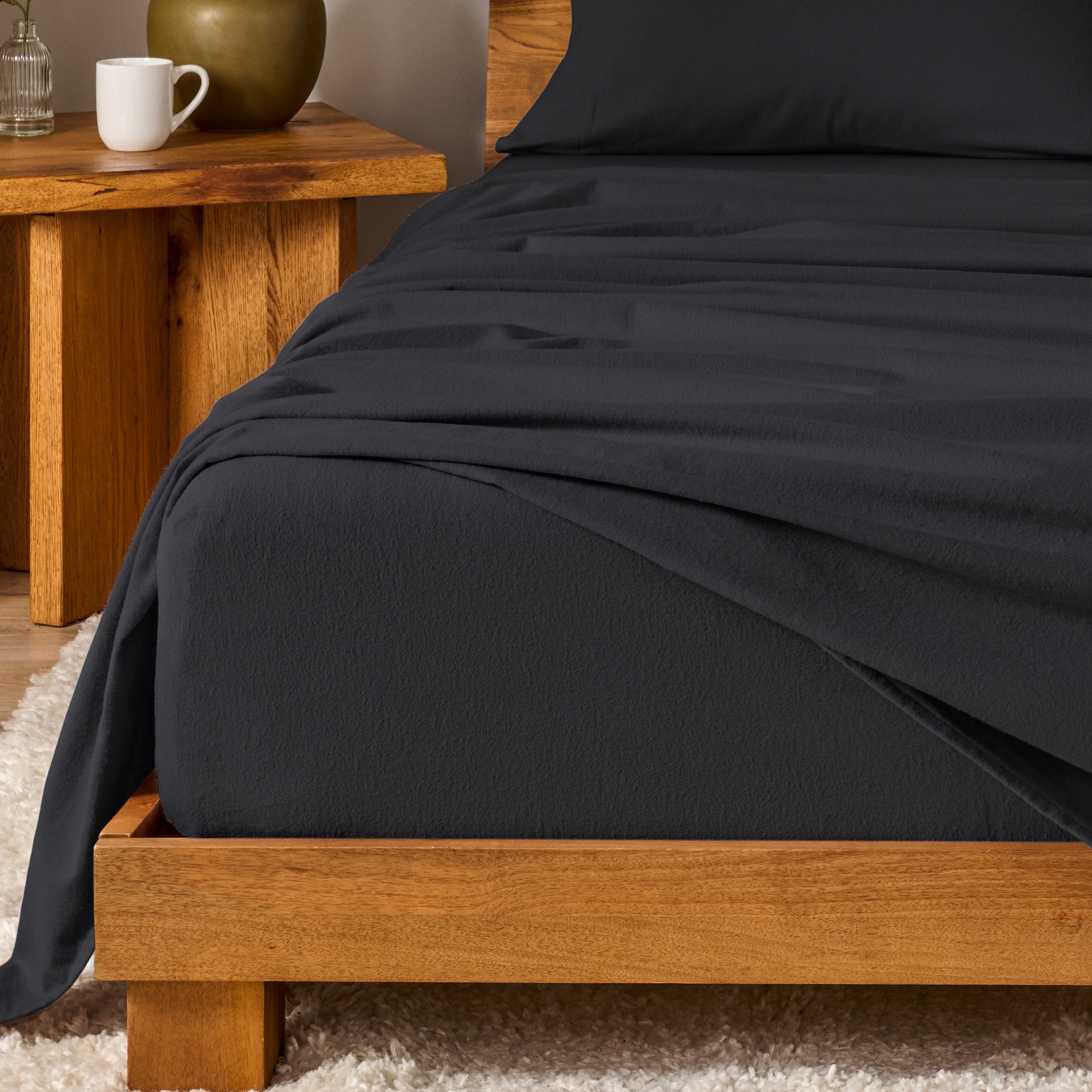 A modern bedroom with cotton flannel sheets on the bed