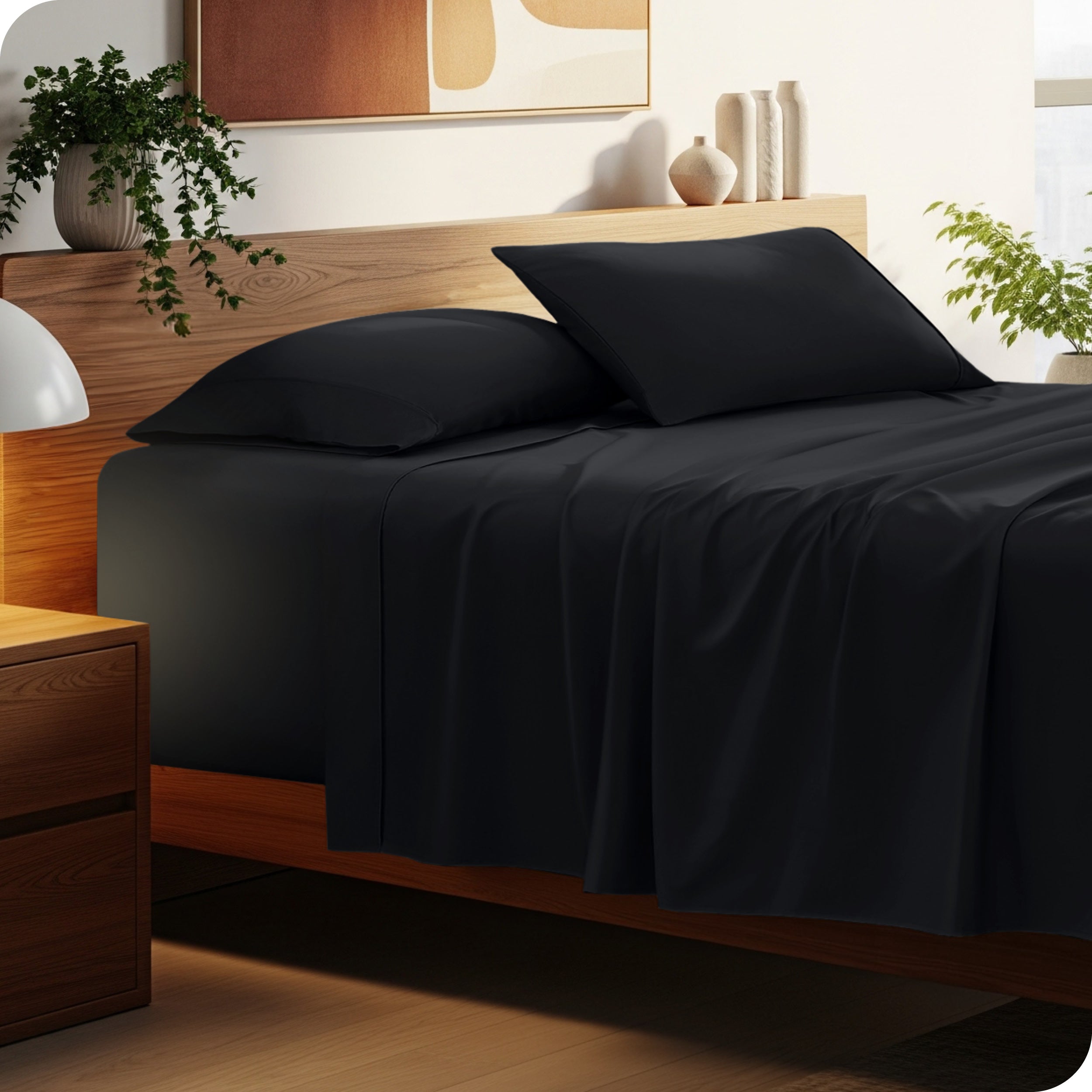 A cozy bedroom featuring a neatly made bed with soft, microfiber sheets