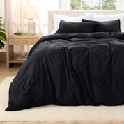 Relaxing room scene with a duvet cover laid out over the bed