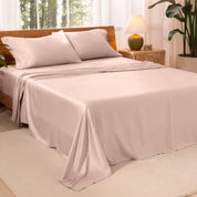 TENCEL™ sheet set on a bed. The flat sheet is draped over the side and end of the bed.