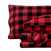Plaid flannel sheets folded and stacked