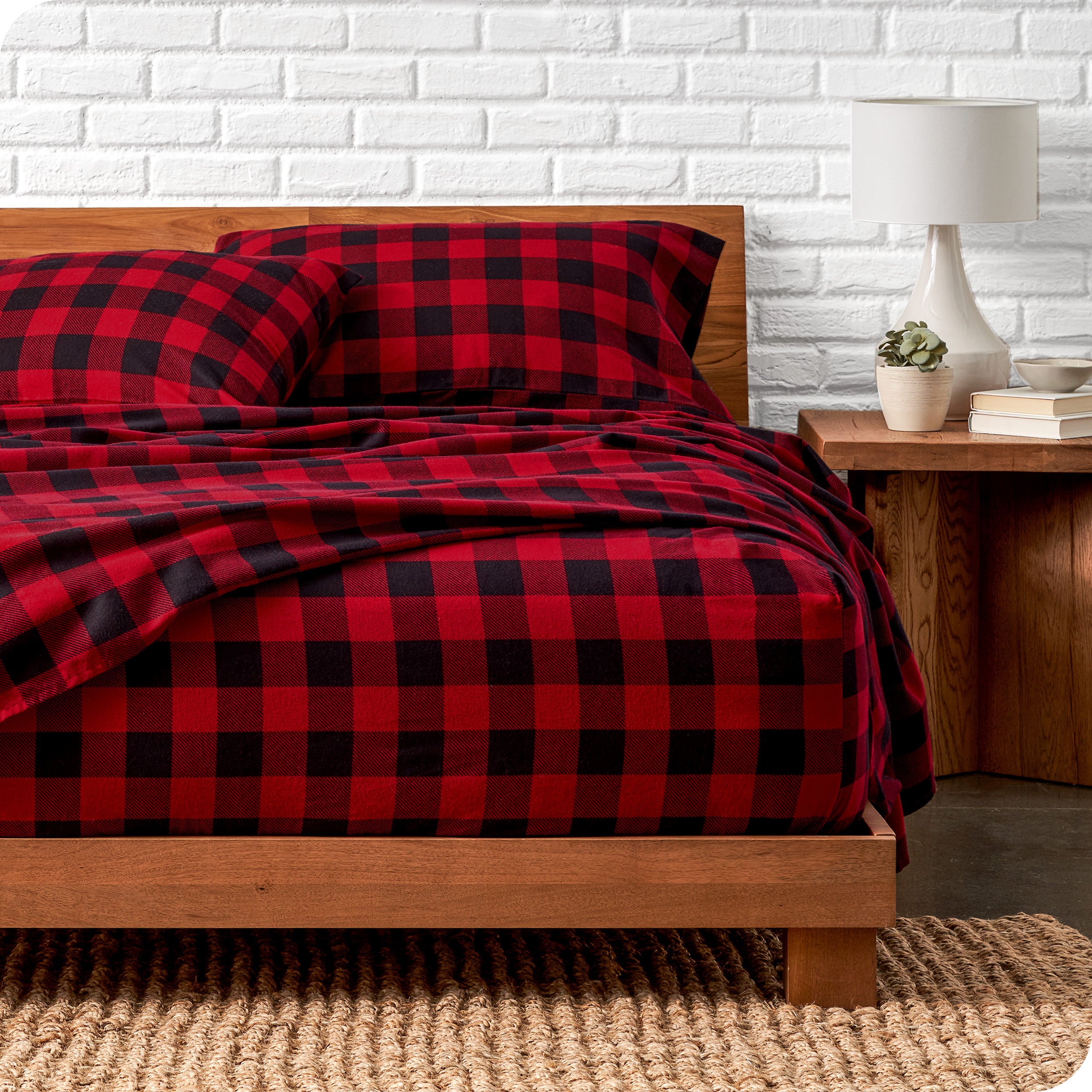 A bed made with cotton flannel sheets