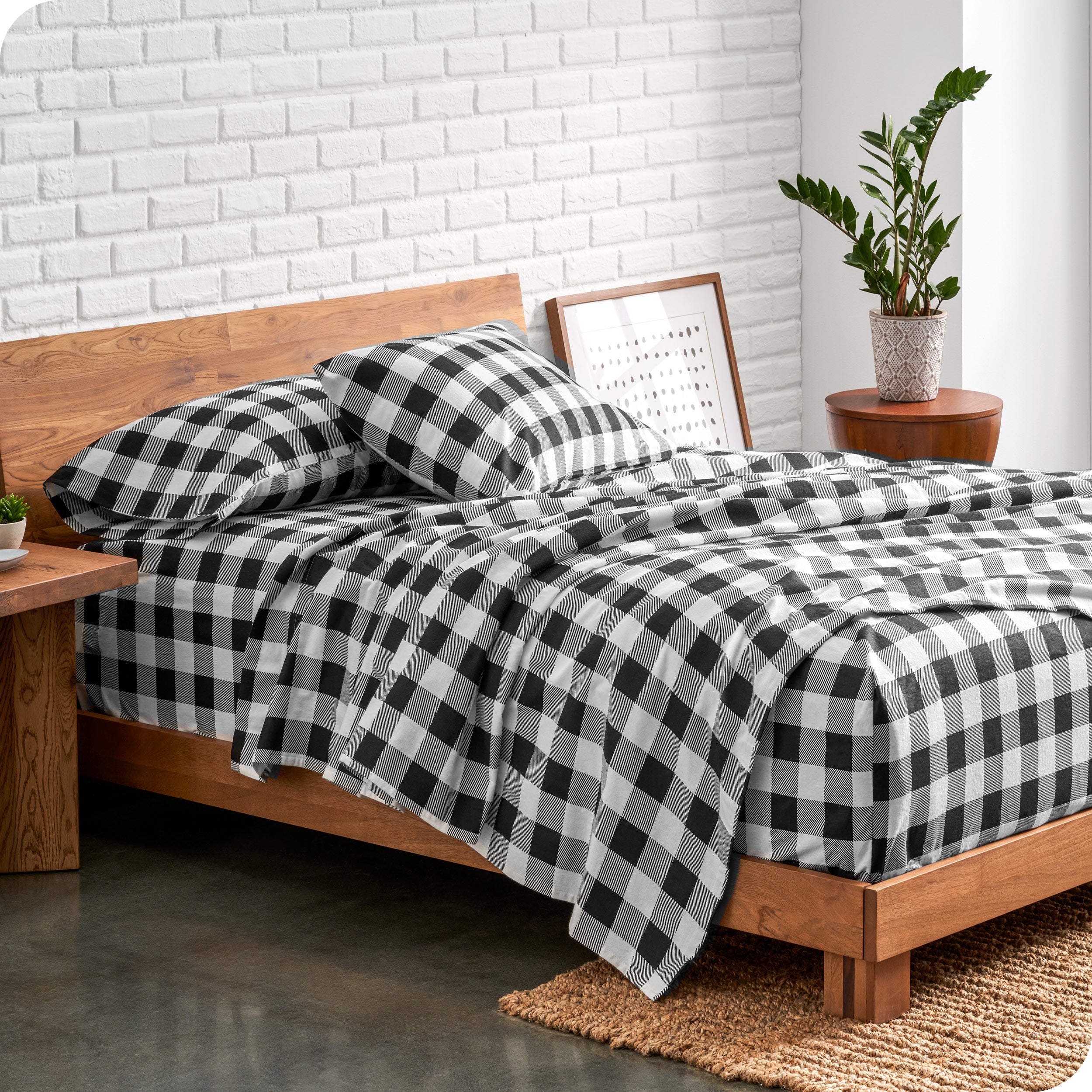 Plaid flannel sheets on a bed