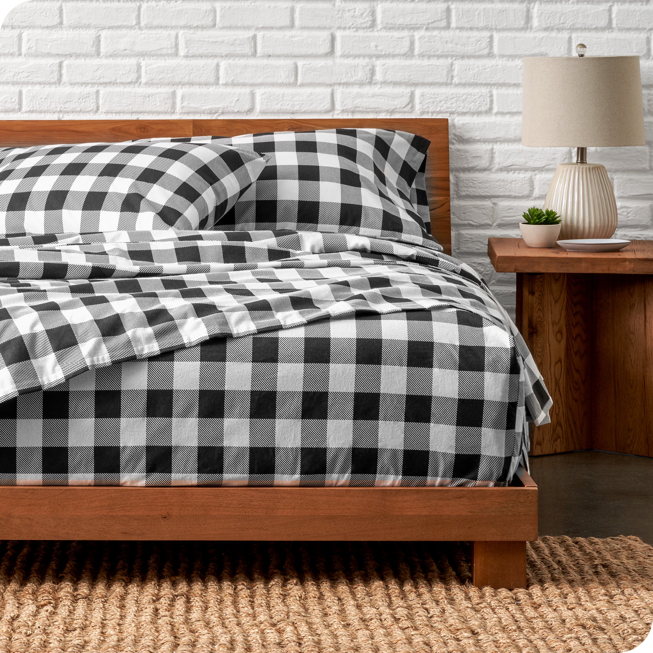 A bed made with cotton flannel sheets