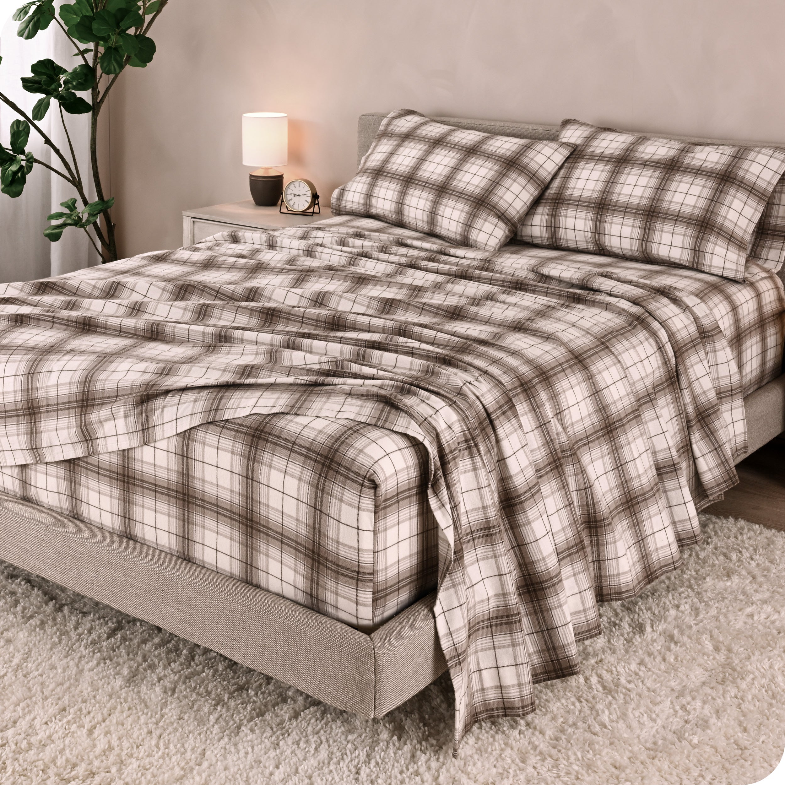 A bed made with cotton flannel sheets