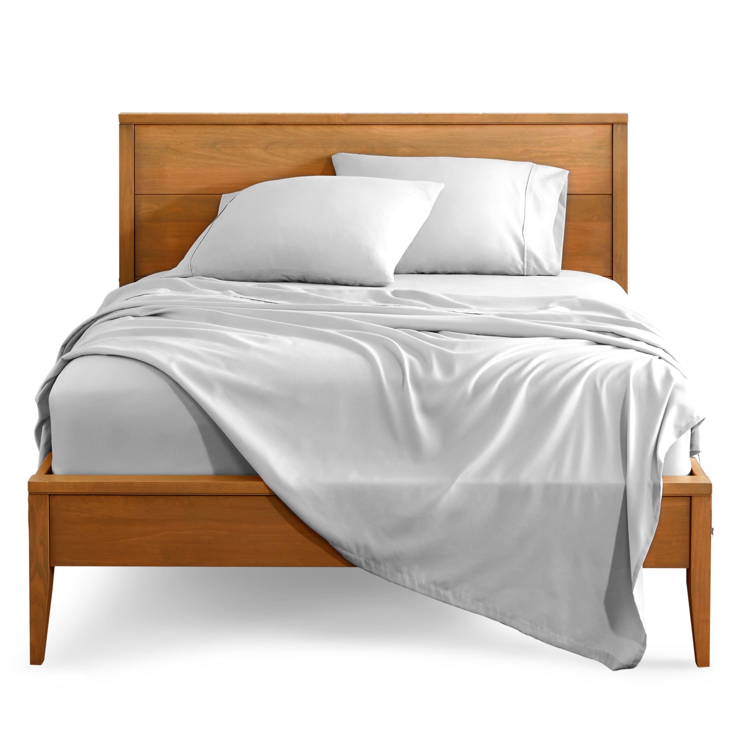 Microfiber sheet set on a bed with a wooden bed frame