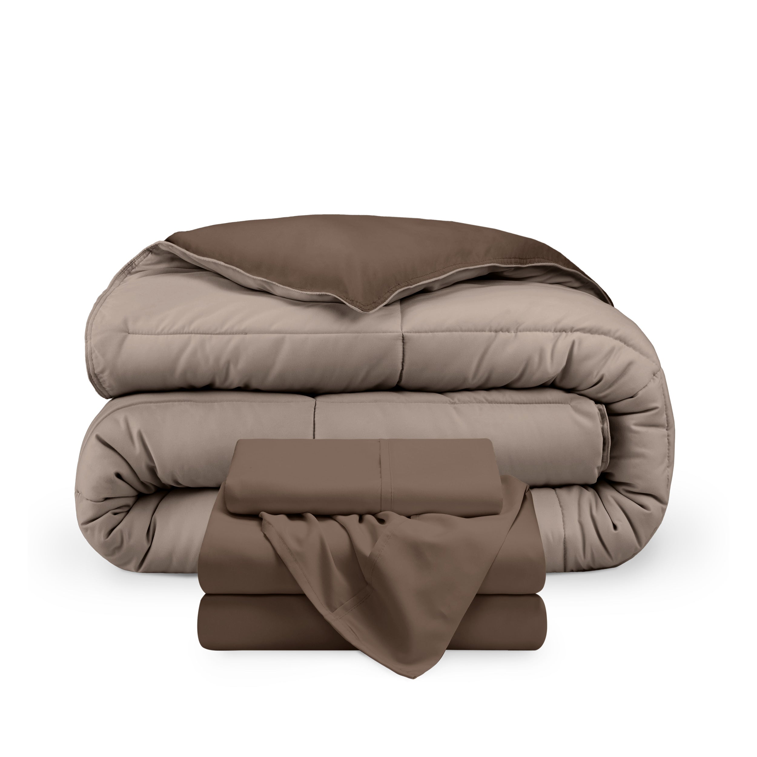 A reversible microfiber comforter and a coordinating sheet set folded and stacked