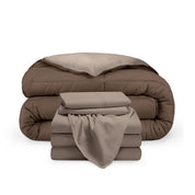 A reversible microfiber comforter and a coordinating sheet set folded and stacked