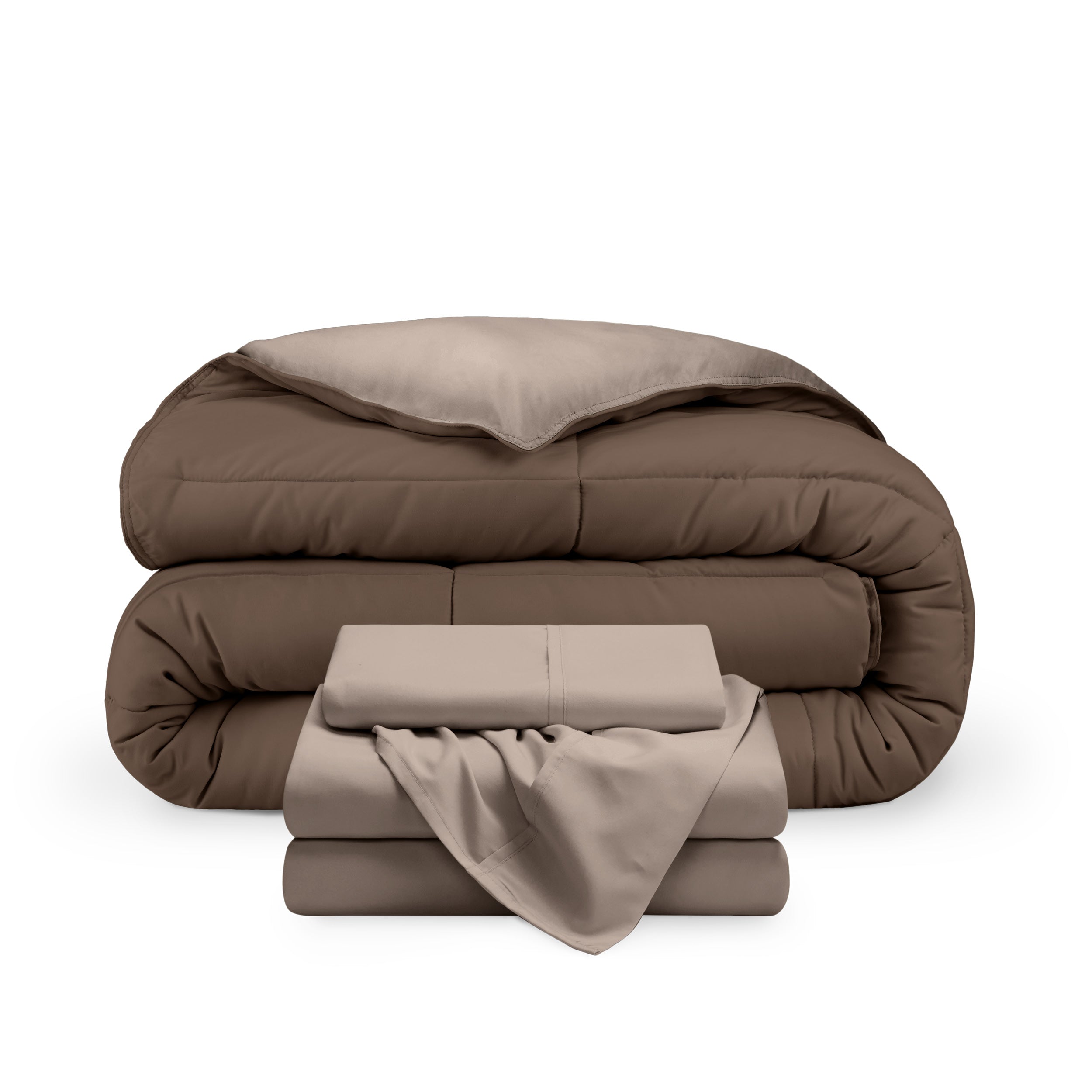 A reversible microfiber comforter and a coordinating sheet set folded and stacked