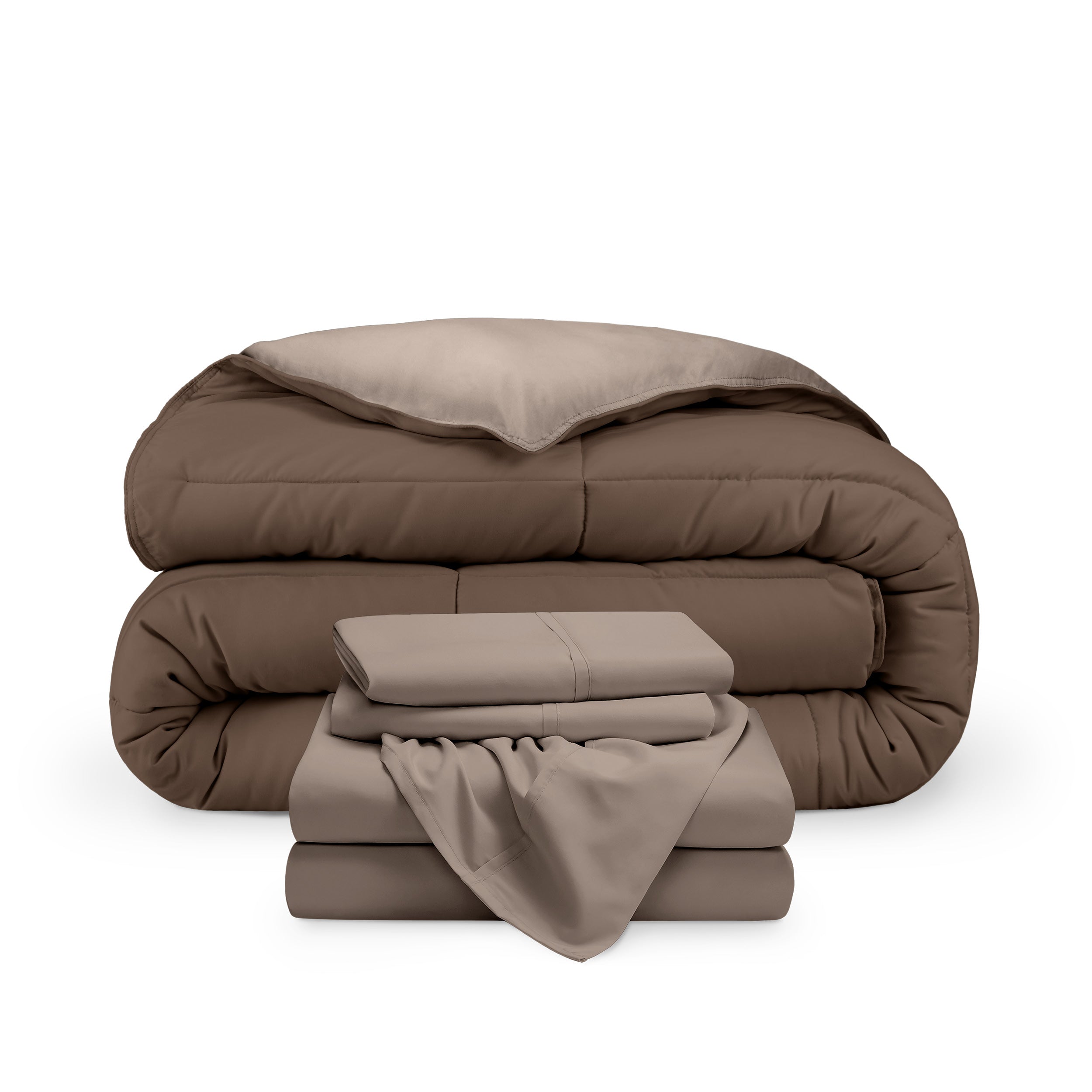 A reversible microfiber comforter and a coordinating sheet set folded and stacked