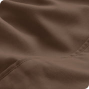 Close-up of the fabric and its neatly finished edge.