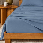 A modern bedroom with cotton flannel sheets on the bed