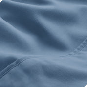 Close-up of the fabric and its neatly finished edge.
