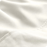 Close-up of the fabric and its neatly finished edge.