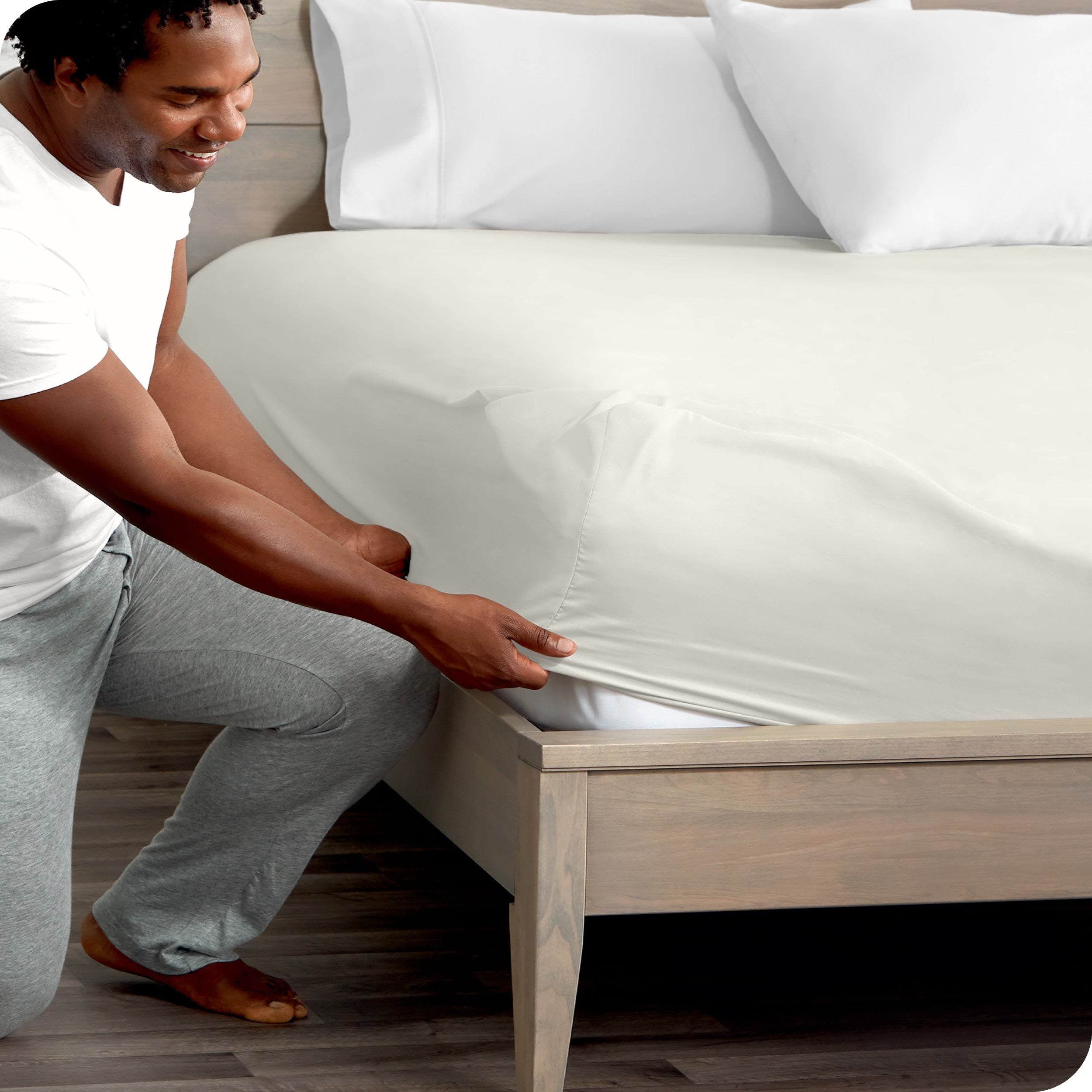 A close up of the elastic of a microfiber fitted sheet.