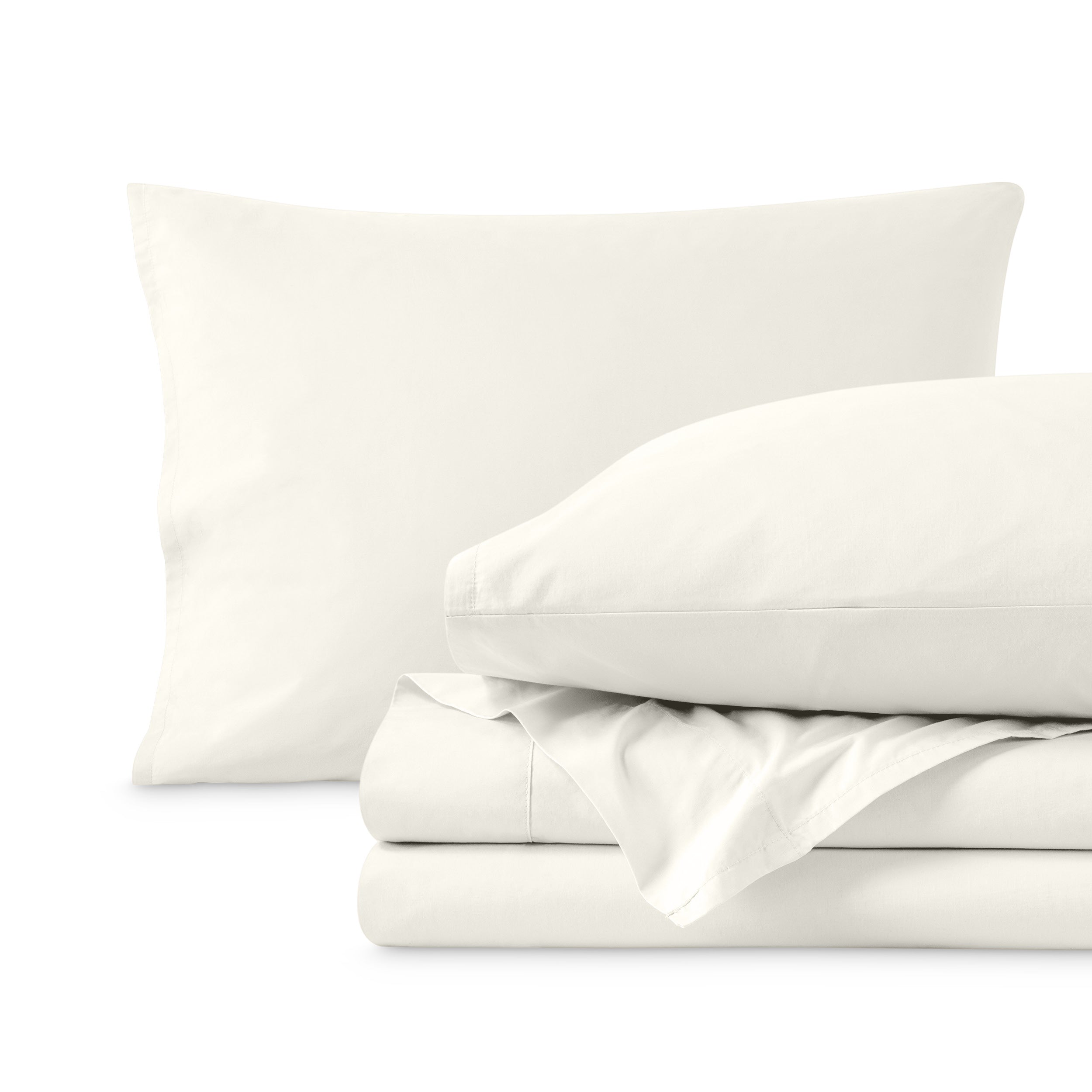 Percale sheet set with two pillows and folded sheets on a white background