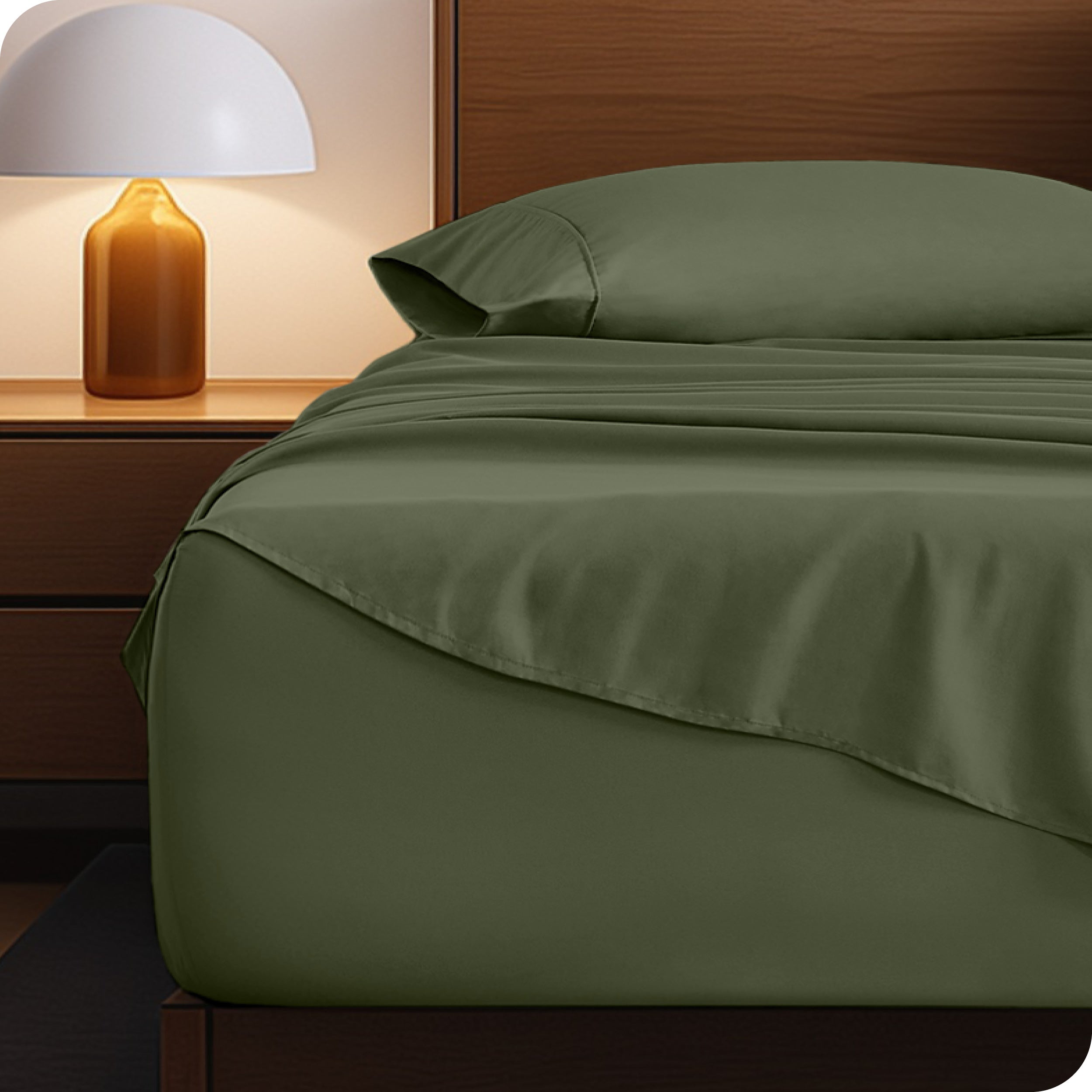 A cozy bedroom with a bed covered in soft microfiber sheets