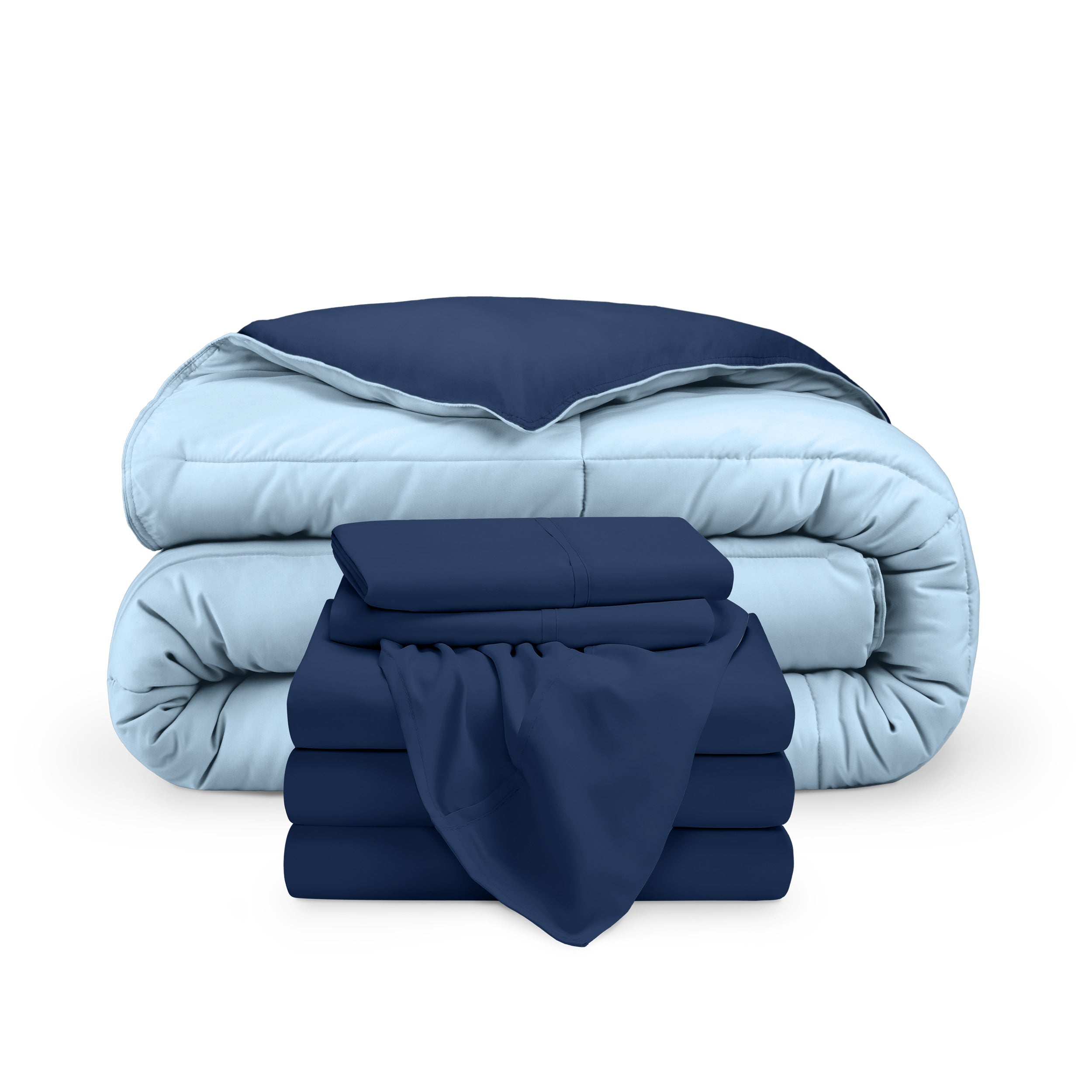 A reversible microfiber comforter and a coordinating sheet set folded and stacked