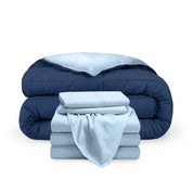 A reversible microfiber comforter and a coordinating sheet set folded and stacked
