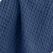 Close up of the texture of the waffle blanket