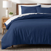 A modern bed with a flannel duvet cover set consisting of the duvet cover and two pillows.