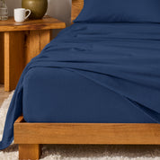 A modern bedroom with cotton flannel sheets on the bed