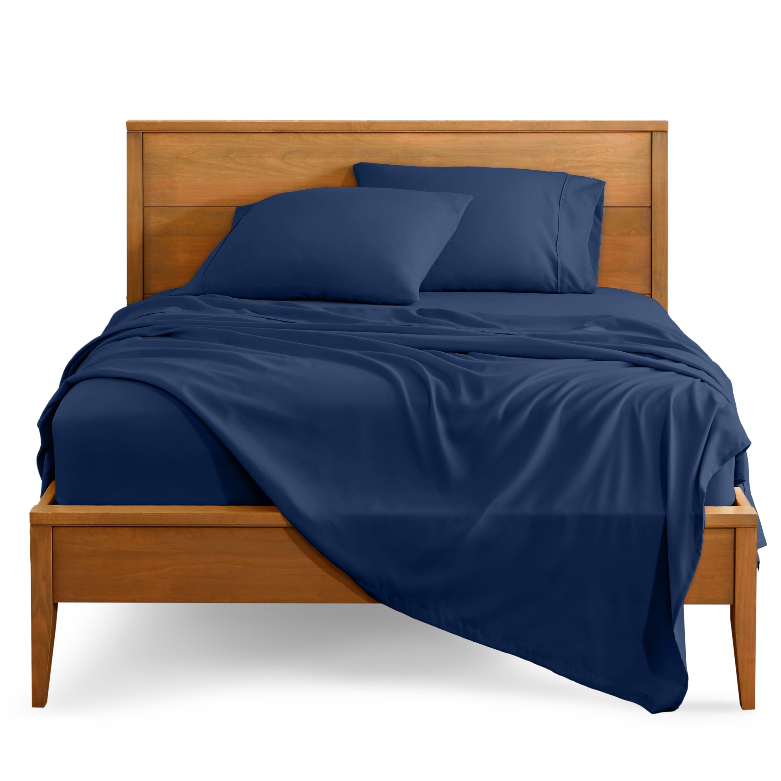 Microfiber sheet set on a bed with a wooden bed frame
