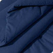 A close up of a track stitch comforter