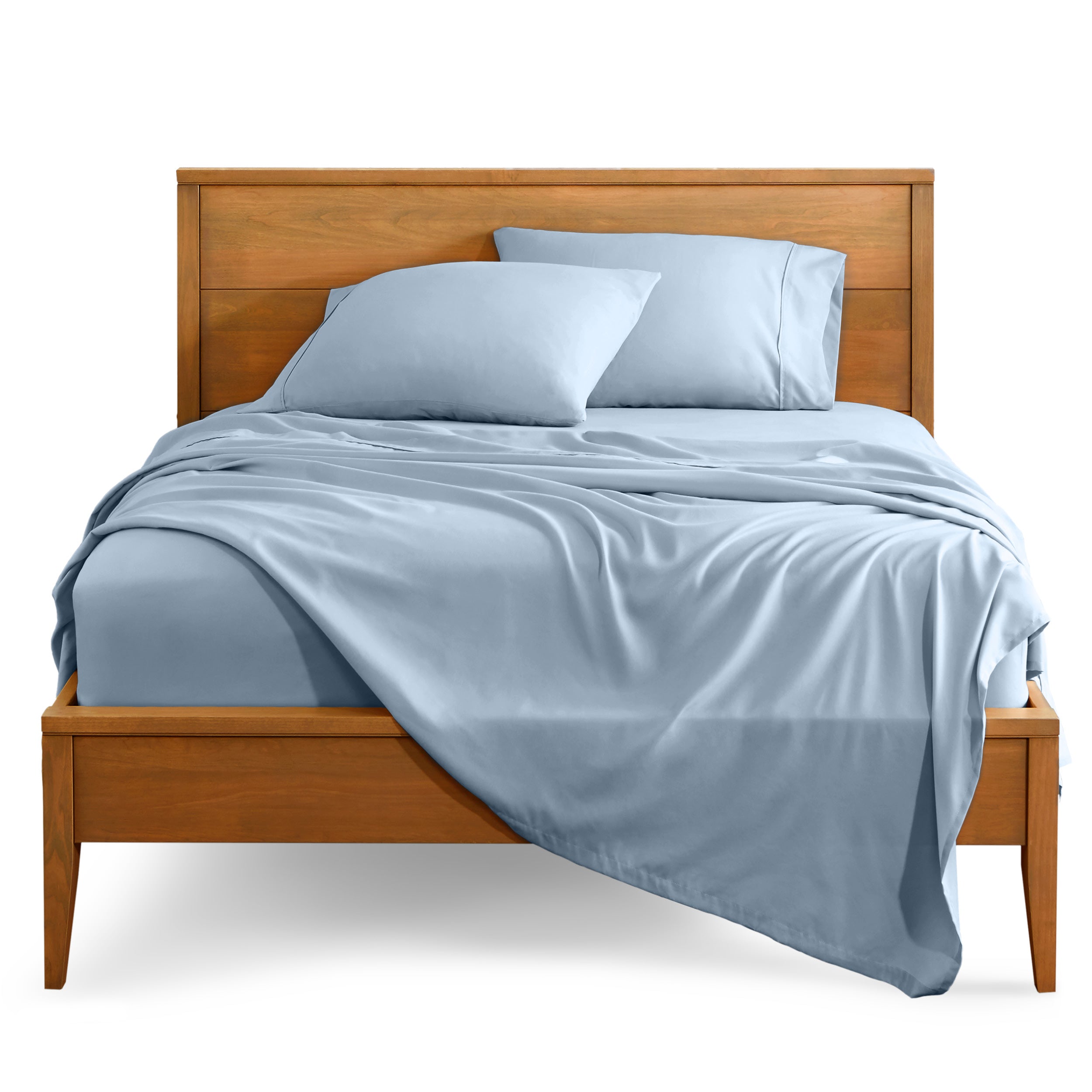 Microfiber sheet set on a bed with a wooden bed frame