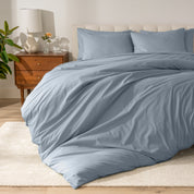 A modern bed with a organic cotton percale duvet cover on.