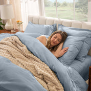 A women sleep on the bed with organic cotton percale duvet cover and pillowcases.