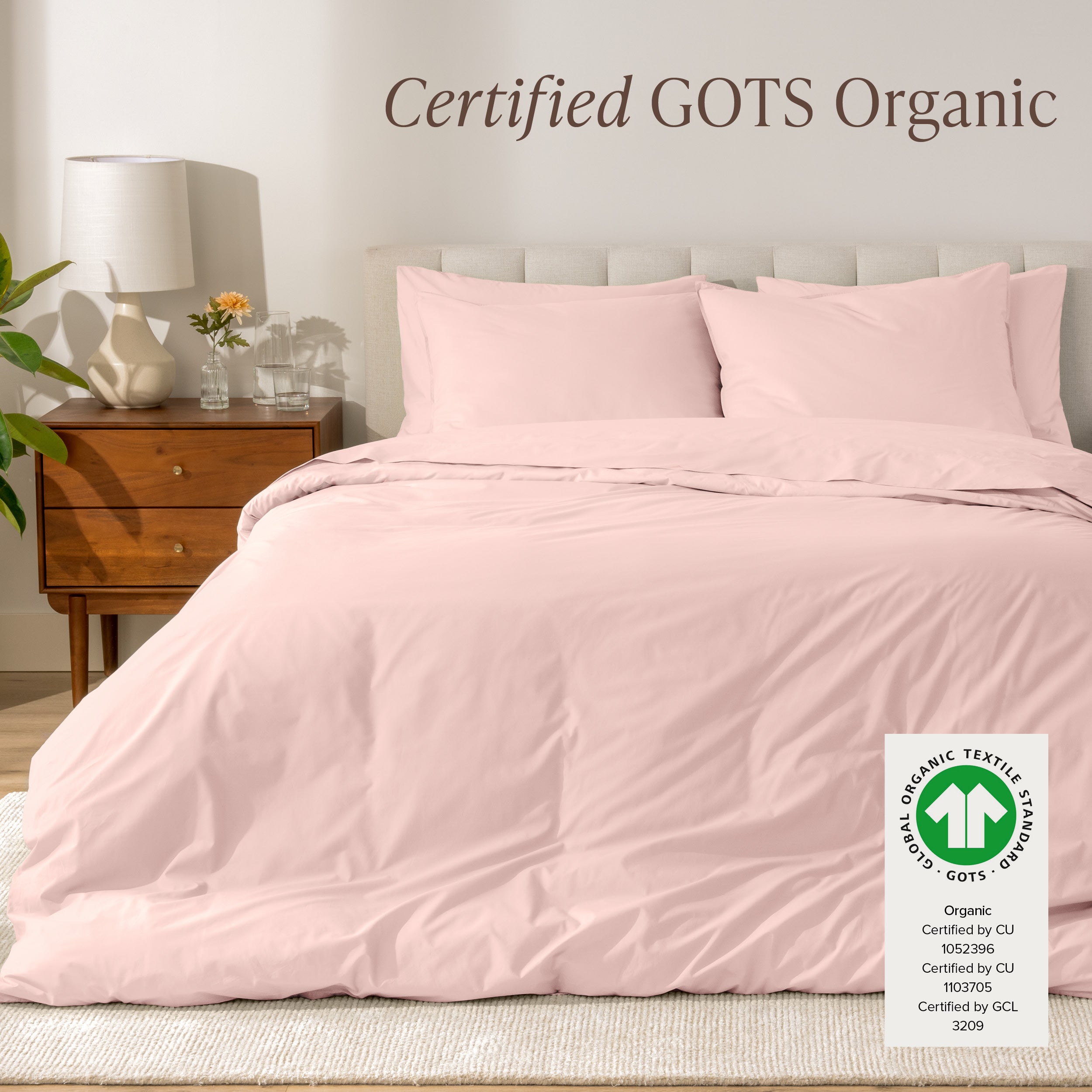 A modern bed with a organic cotton percale duvet cover on, it's Certified GOTS Organic.
