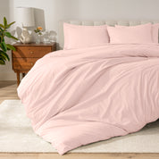 A modern bed with a organic cotton percale duvet cover on.