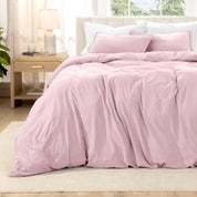 Relaxing room scene with a duvet cover laid out over the bed