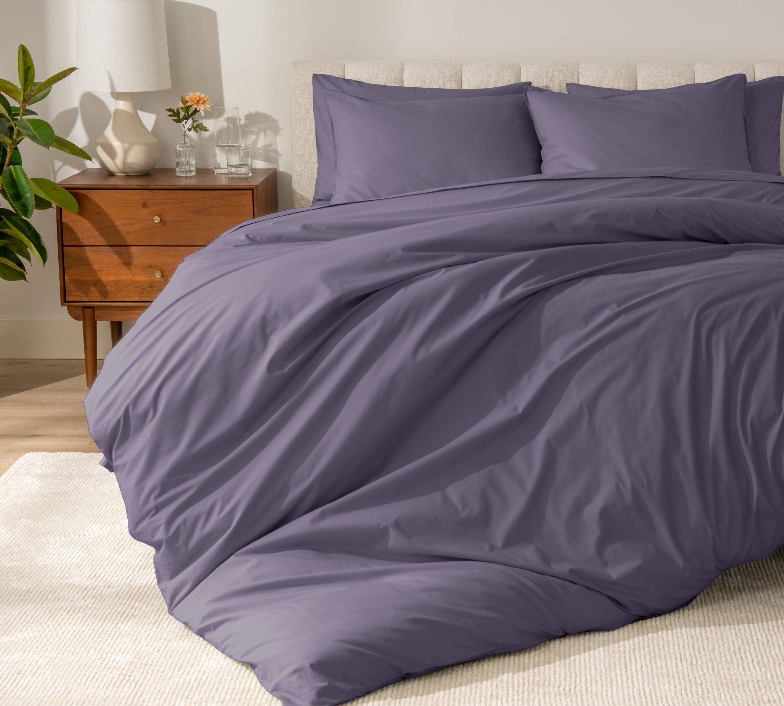 A modern bed with a organic cotton percale duvet cover on.
