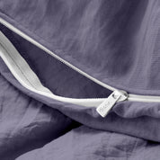 Close up of the zipper on the duvet cover partially opened