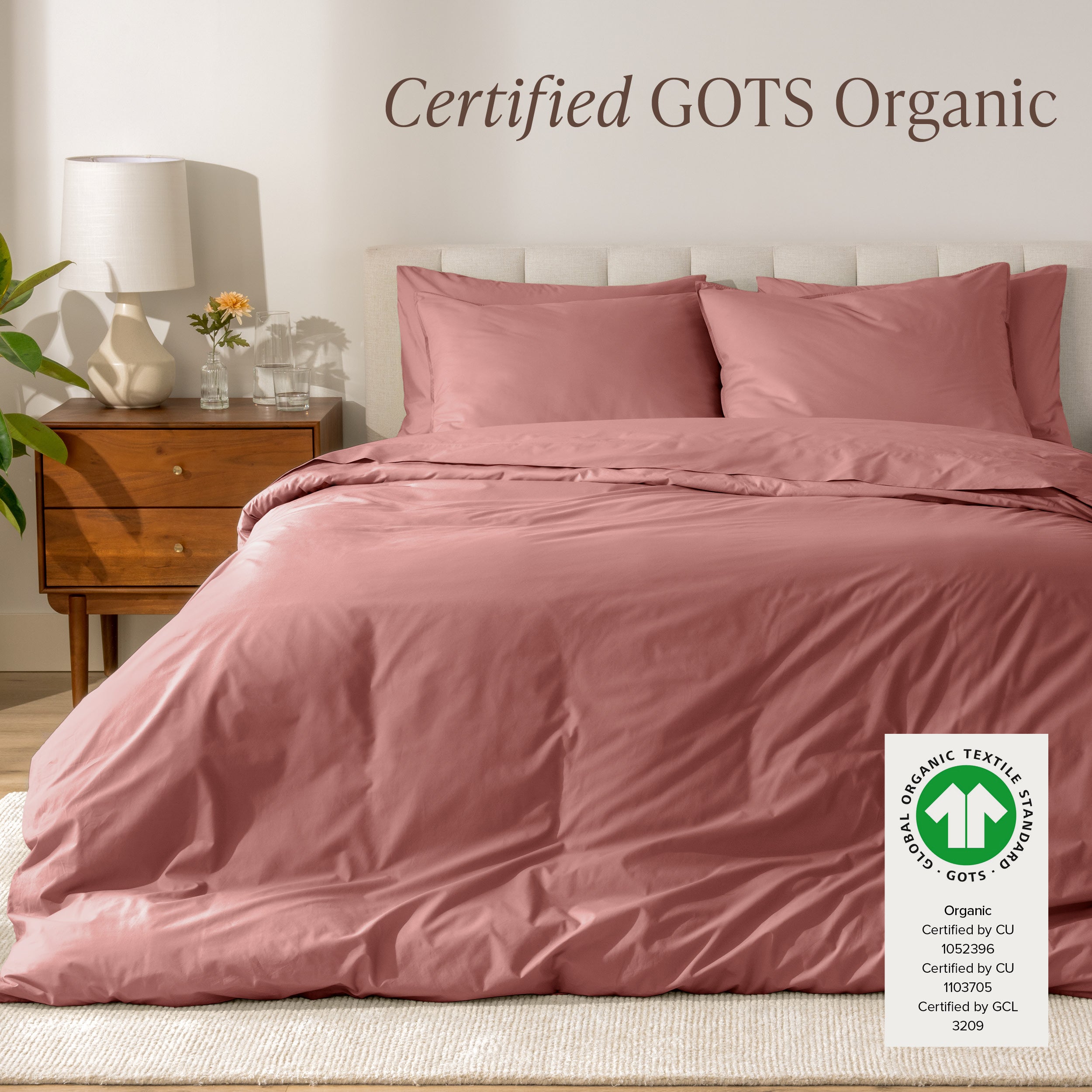 A modern bed with a organic cotton percale duvet cover on, it's Certified GOTS Organic.