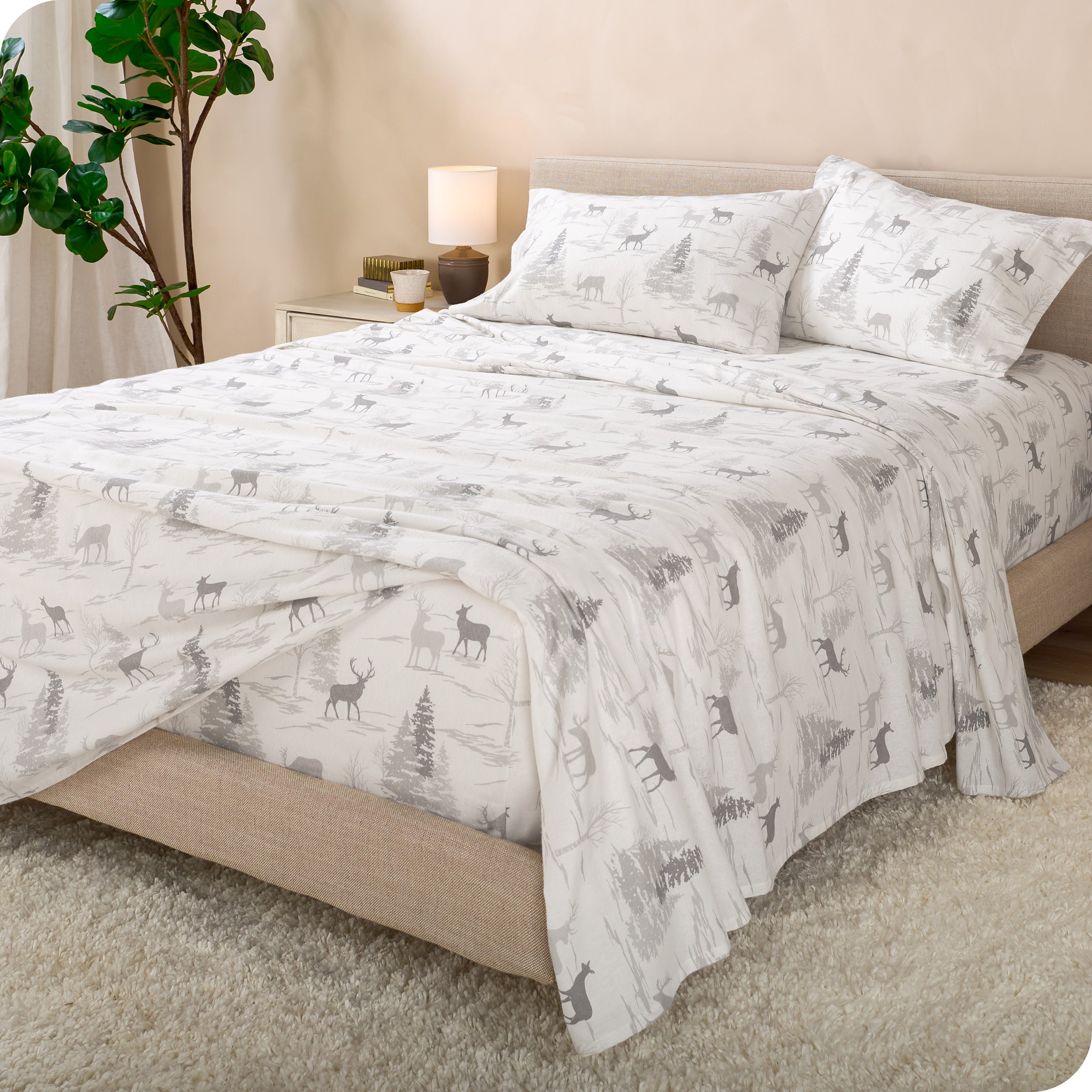 A bed made with cotton flannel sheets