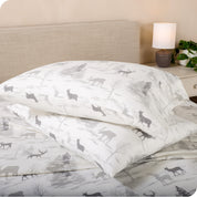 Printed flannel pillowcases and sheets on a bed