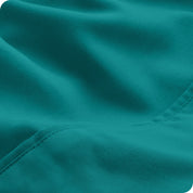 Close-up of the fabric and its neatly finished edge.