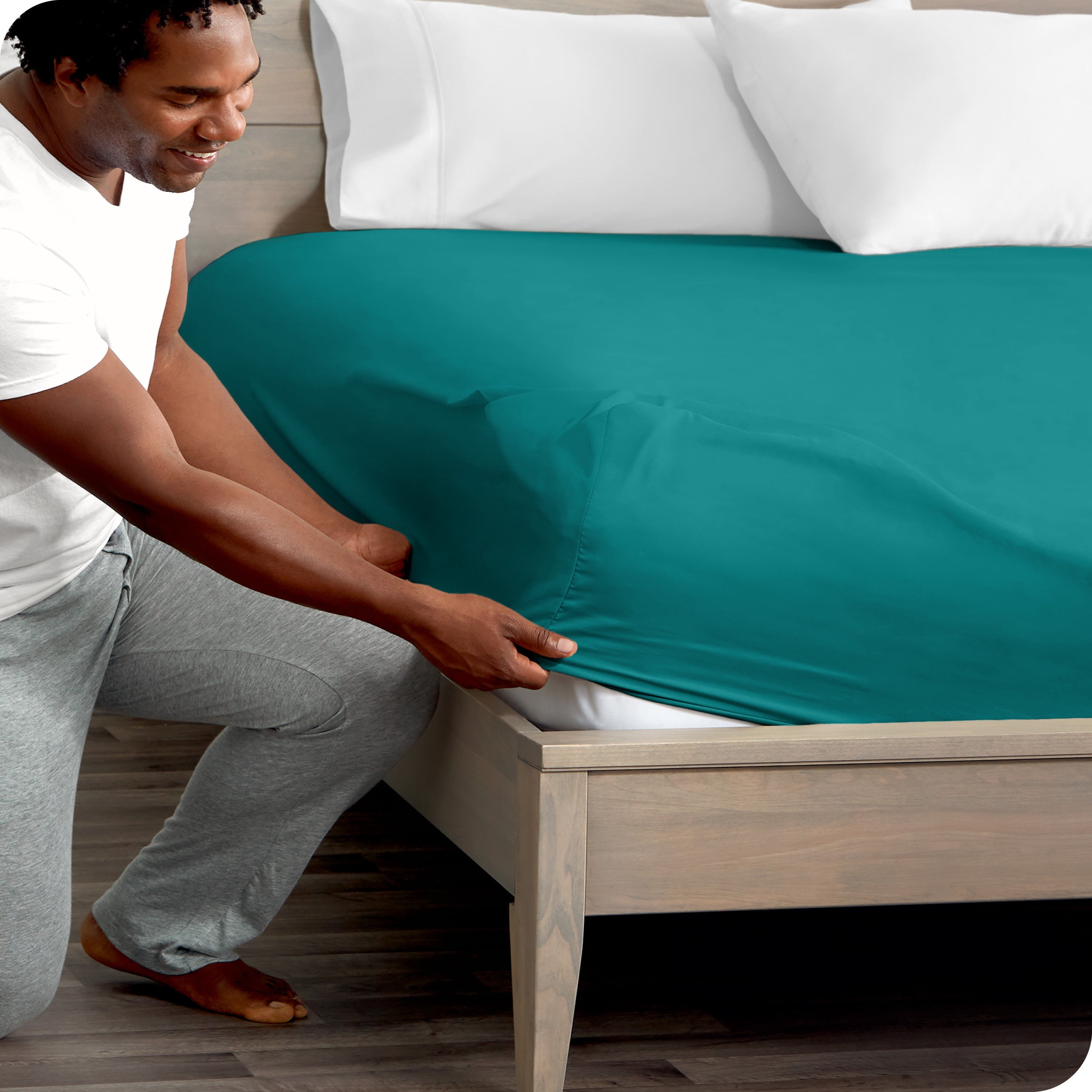 A close up of the elastic of a microfiber fitted sheet.