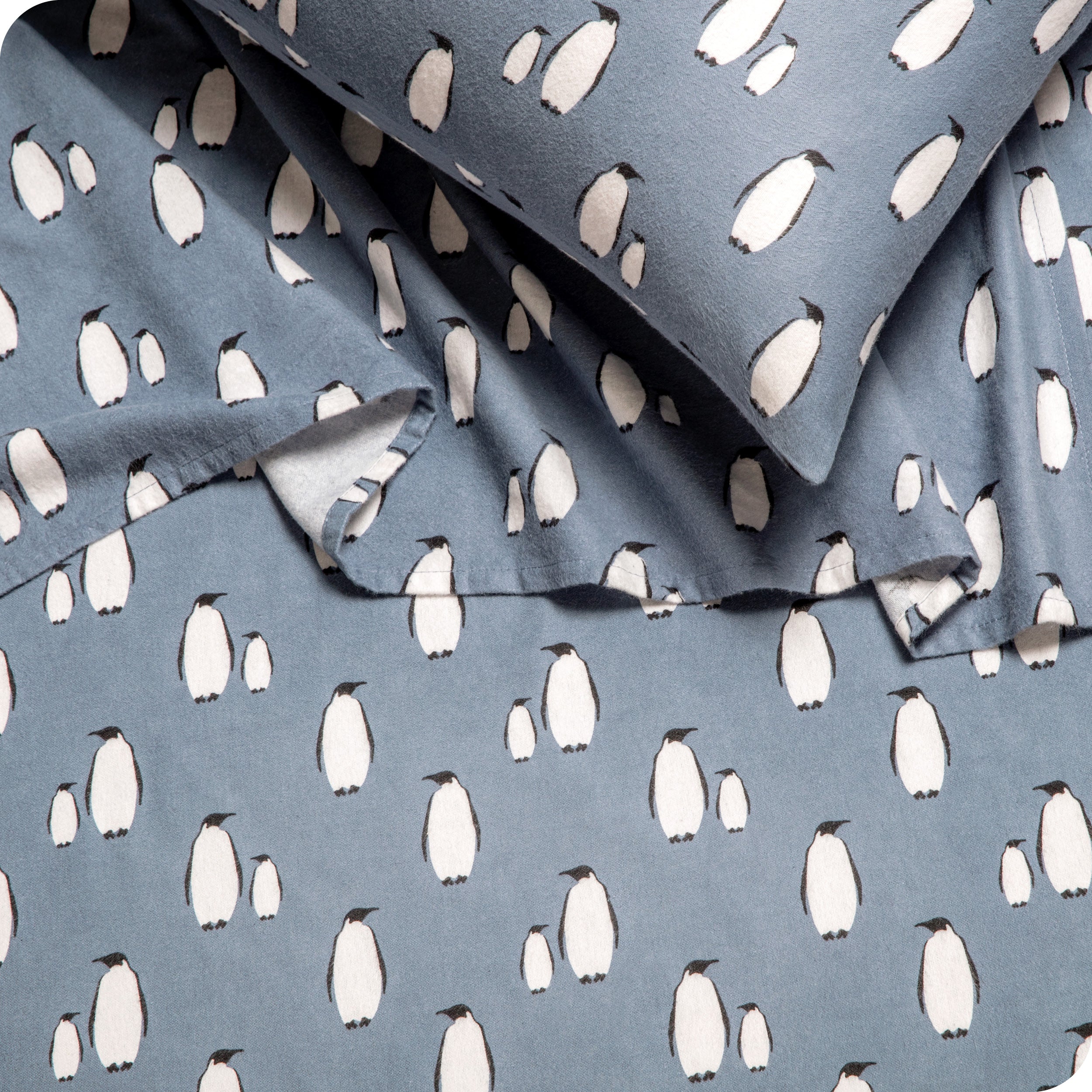 Close up of matching flannel print sheets and pillowcases