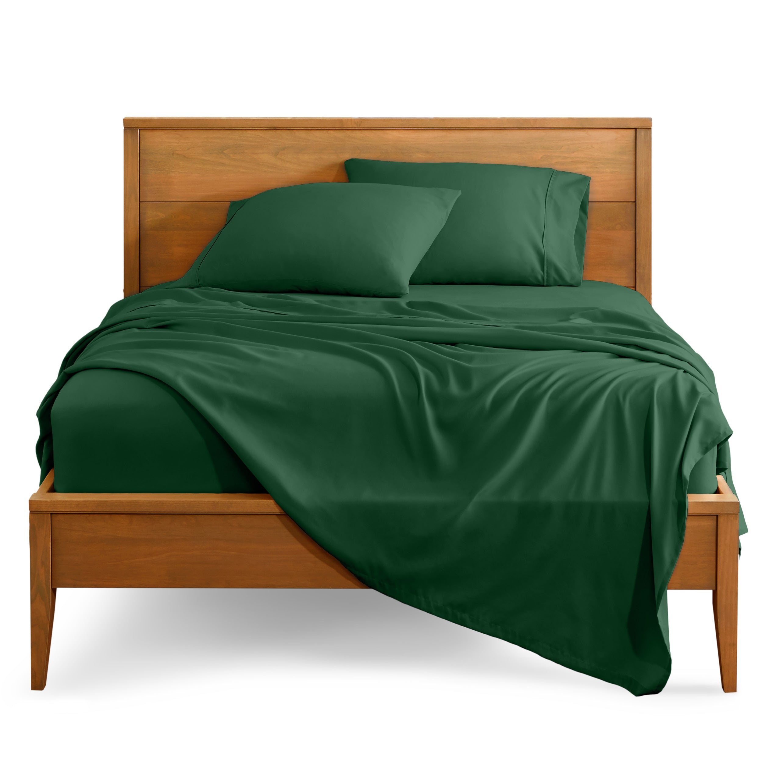 Microfiber sheet set on a bed with a wooden bed frame