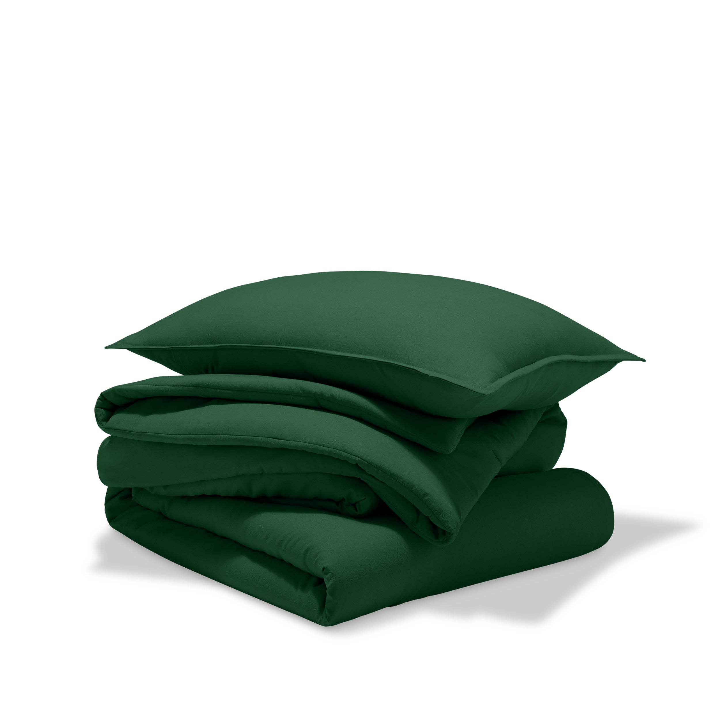 A comforter folded with a matching pillow sham stacked on top