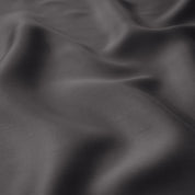 Close up of the corner ties on a TENCEL™ duvet cover
