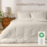 A modern bed with a organic cotton percale duvet cover on, it's Certified GOTS Organic.